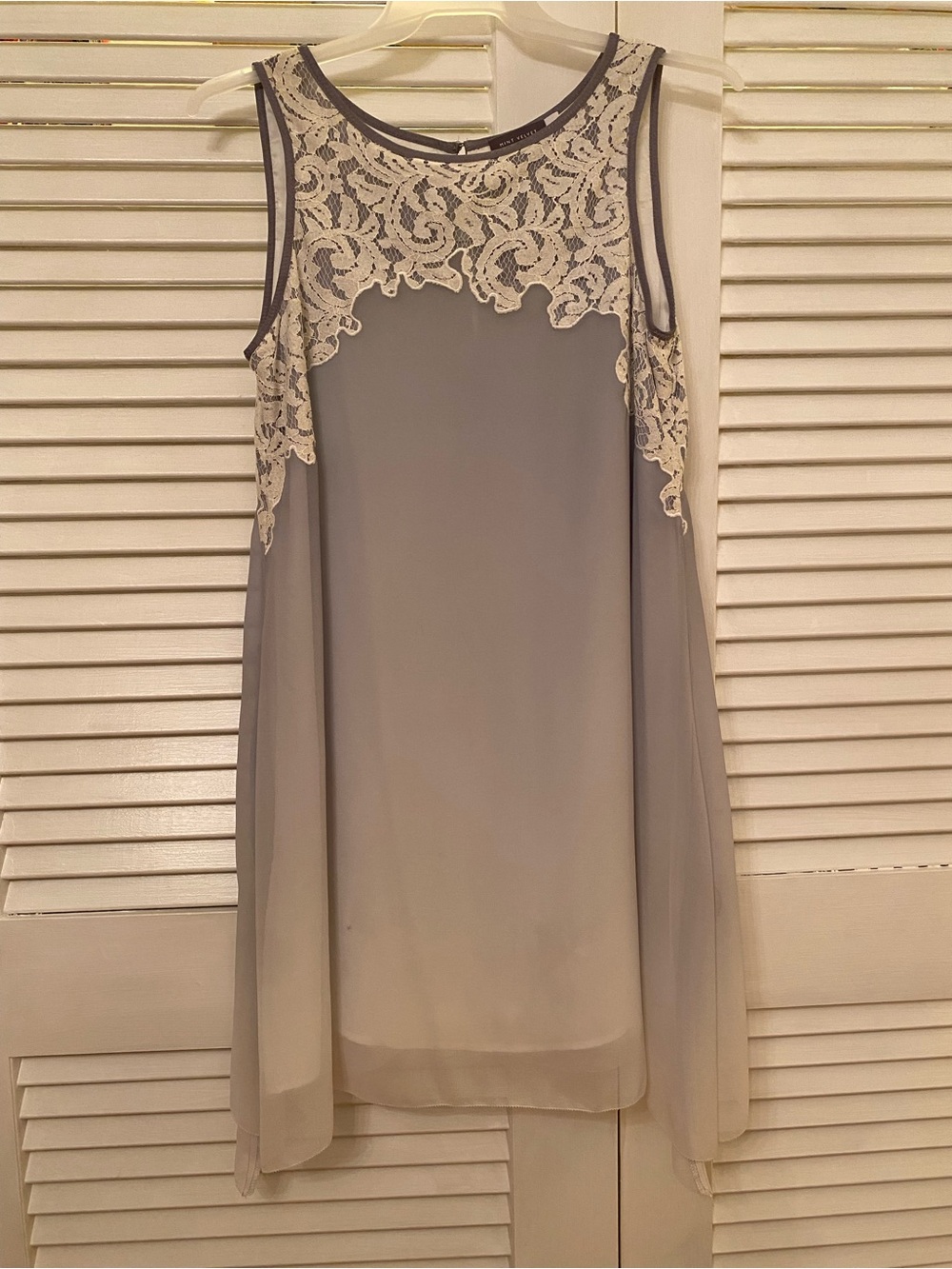 Sleeveless lined dress in soft grey with ivory lace yoke from Mint Velvet